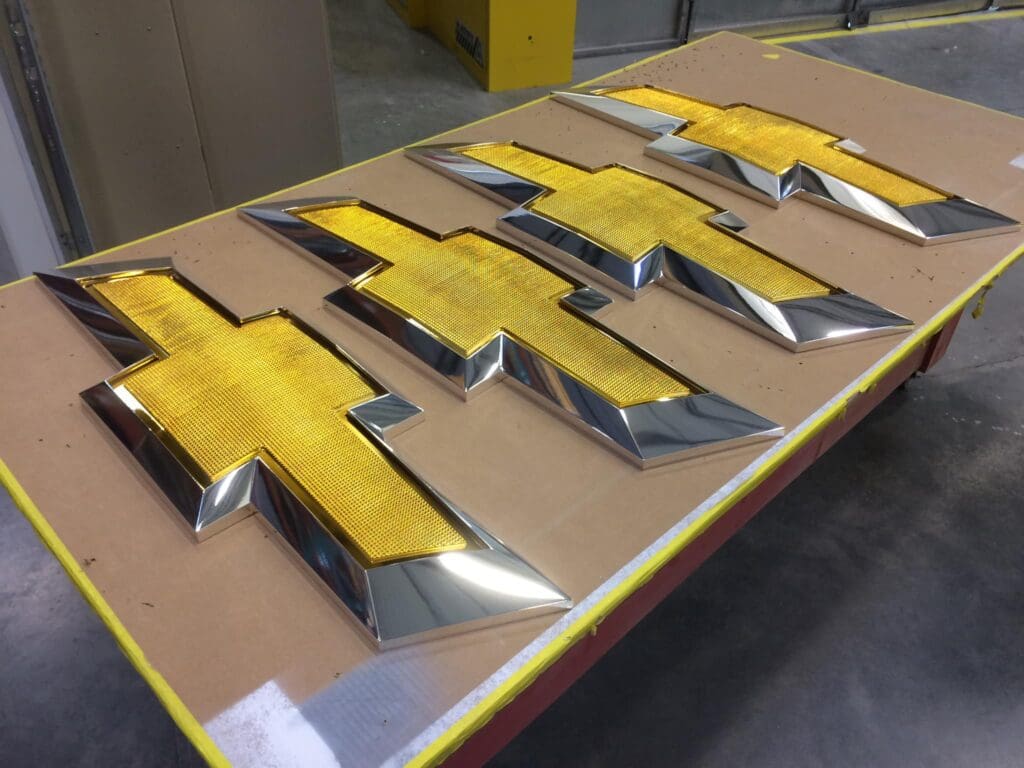 Chevy Bow Tie Signs made from foam and coated with Cosmichrome